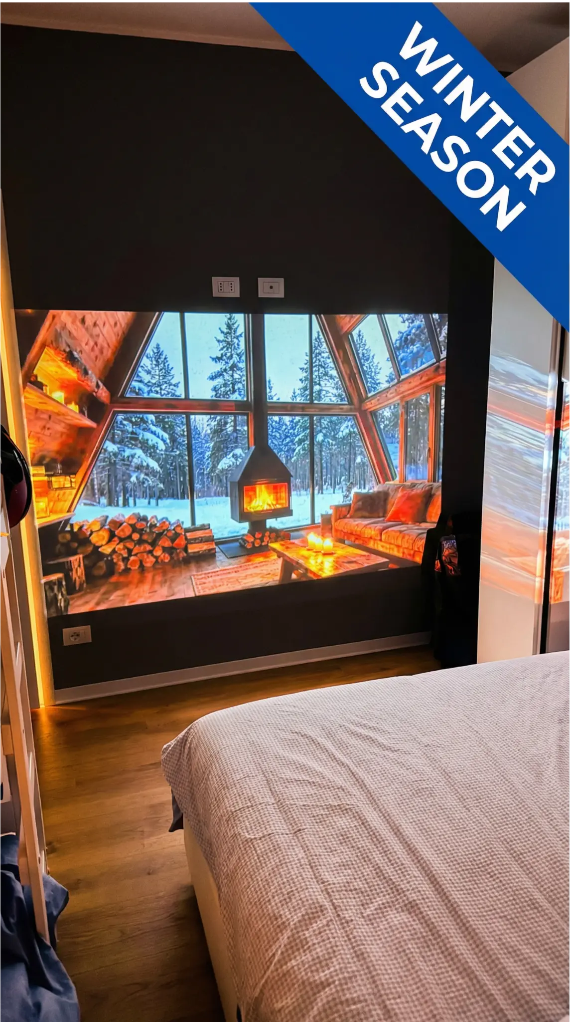 Camera da letto con TV e vista montagna